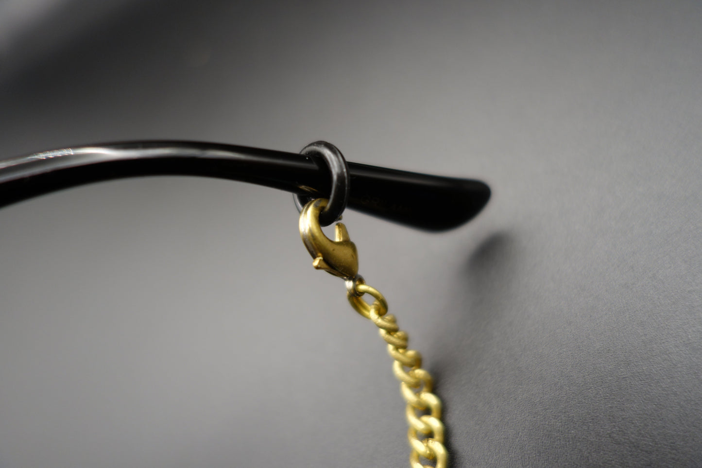 Blue Tiger’s Eye Brass Eyewear Chain – Bold Style with Meaningful Detail